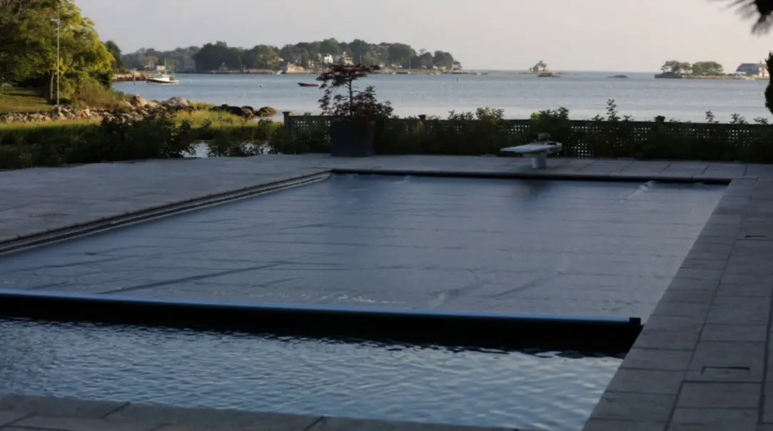 Custom residential pool with automatic cover